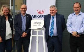 MINISTER SEES PIONEERING APPROACH TO SALMON FARMING